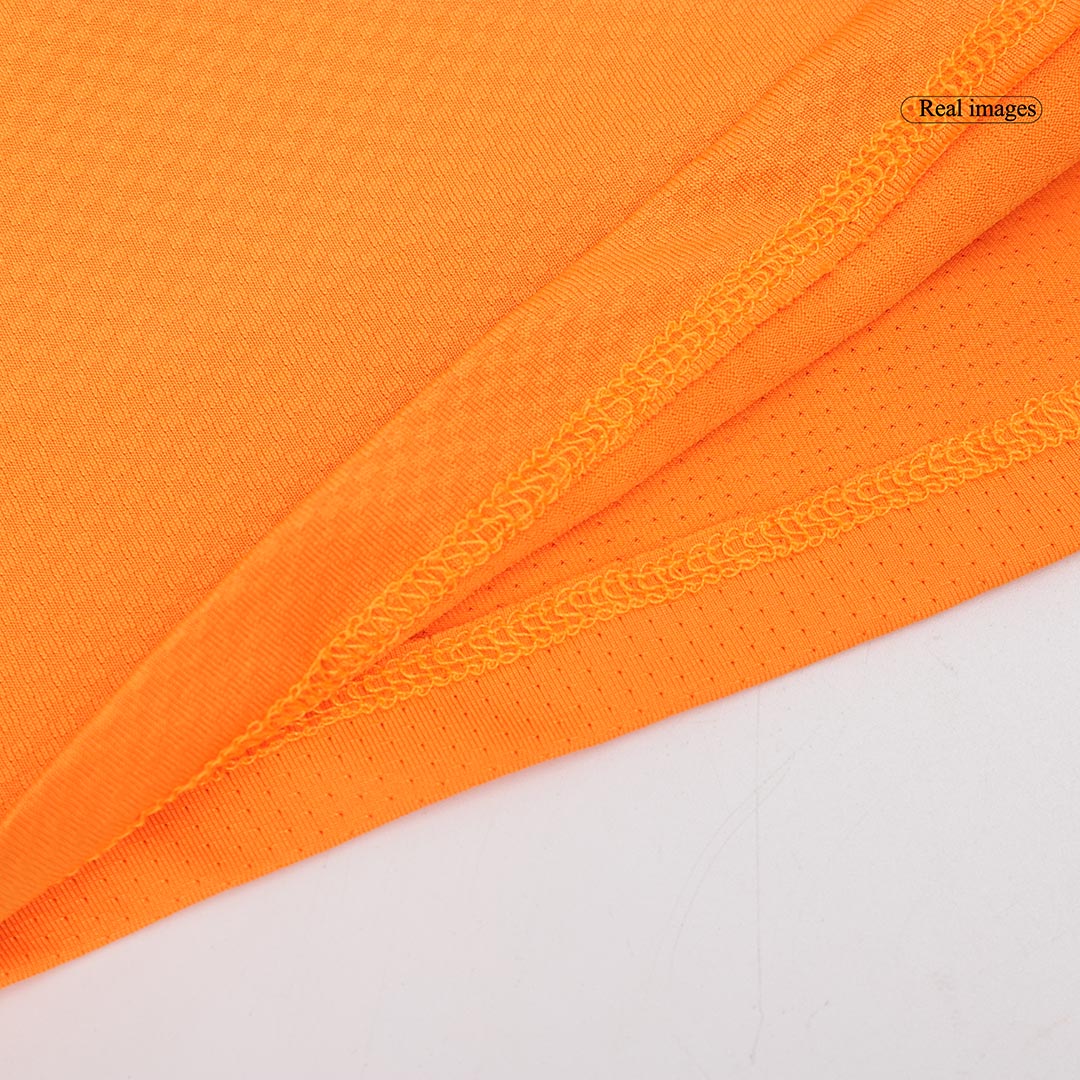 Regalo: Camiseta/Polo del equipo de carreras McLaren F1 2024