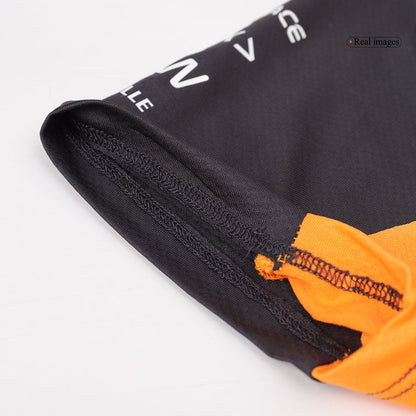 Regalo: Camiseta/Polo del equipo de carreras McLaren F1 2024
